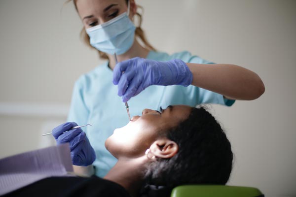 dentist caring for patient